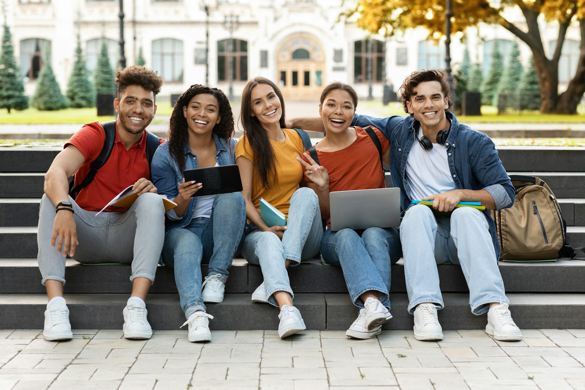 Education Abroad. Group Of International Students Posing Outdoors