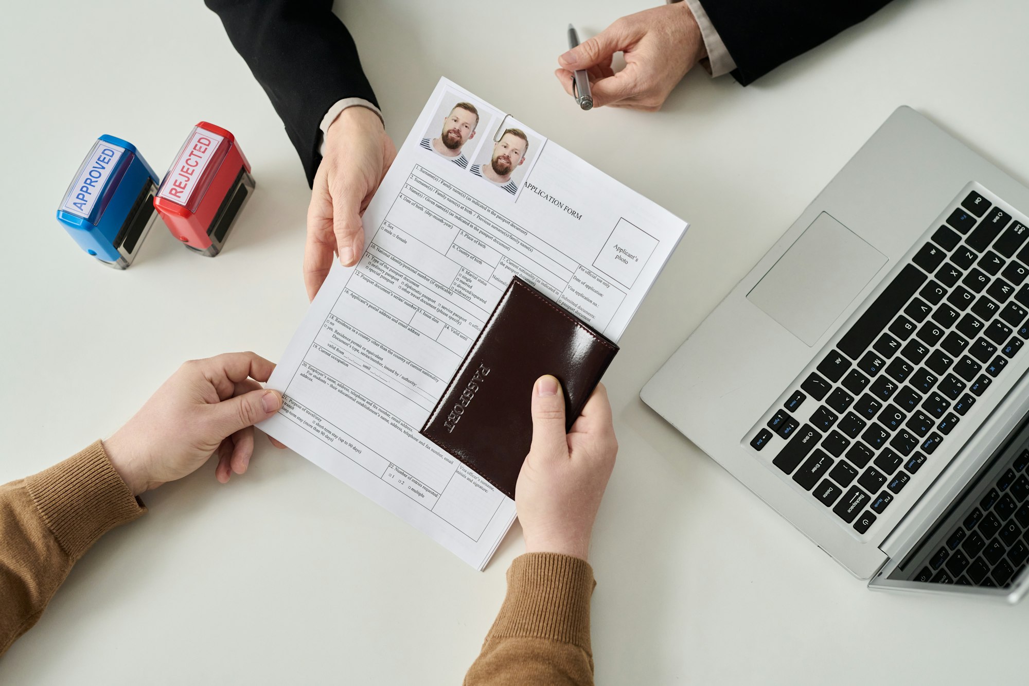 Man applying for visa in immigration office